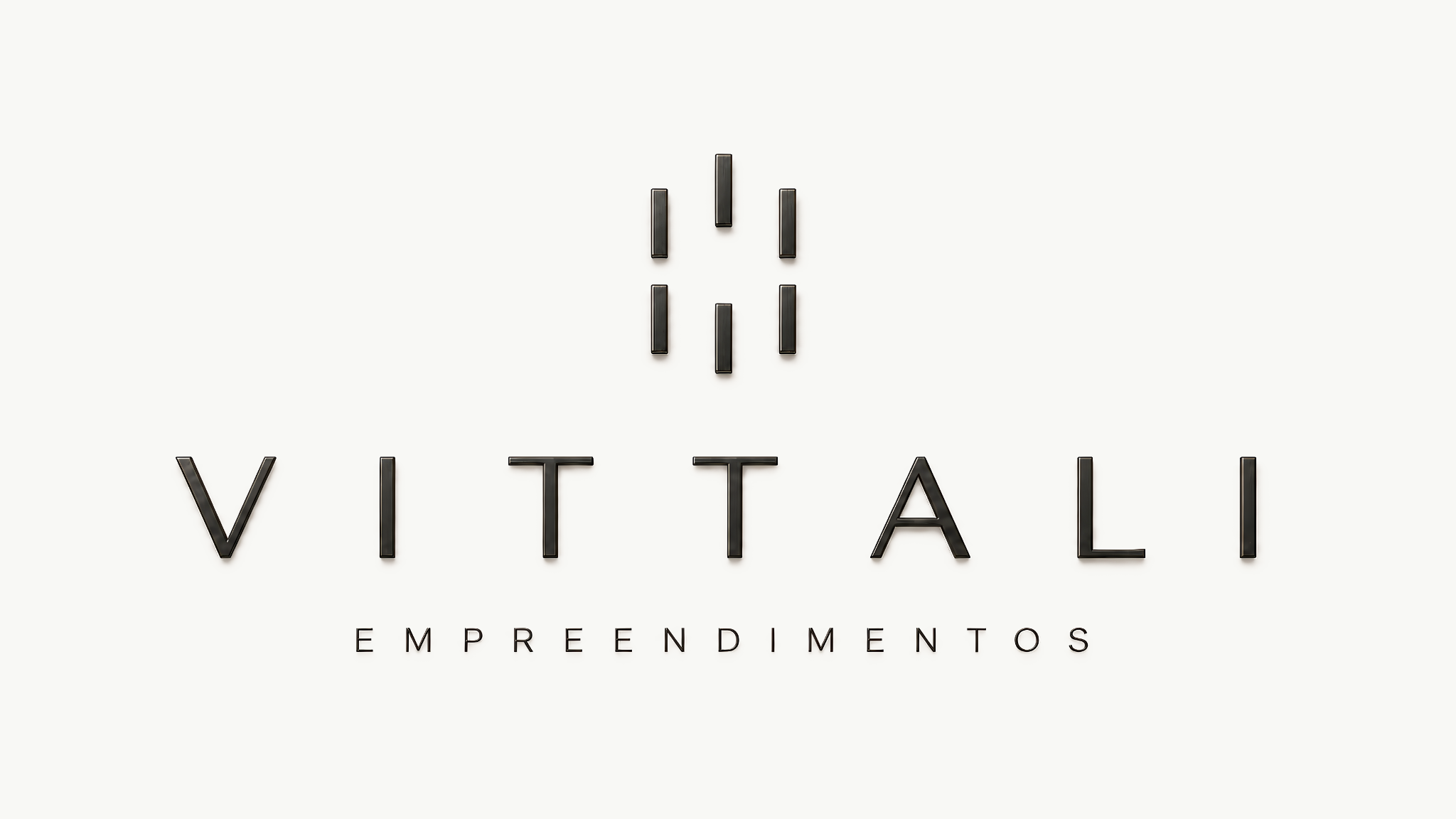 Logomarca Vittali Empreendimentos em metal grafite